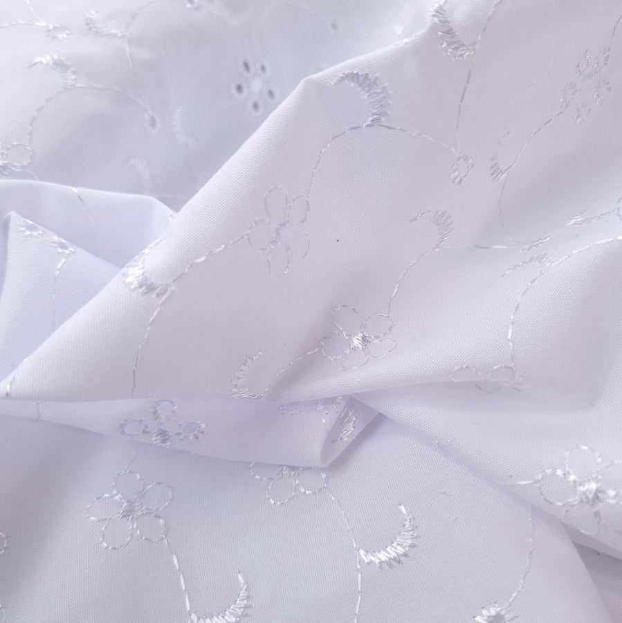 5 Hole Broderie Anglaise Fabric Moons White Close Up