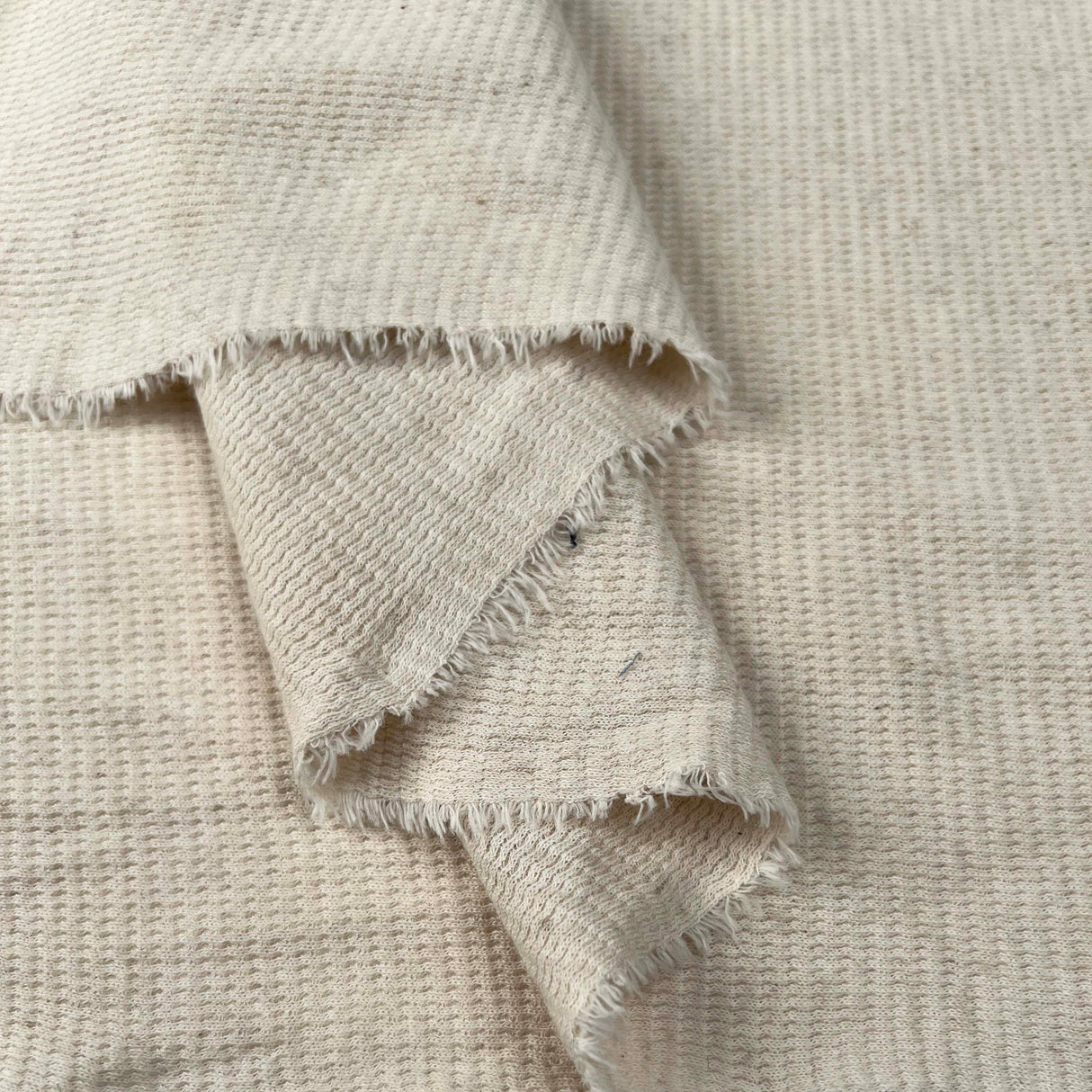 Ecru_Knit_Waffle_Jersey_Cotton_Linen_Stretch_Plain_Jersey_Fabric_Fold