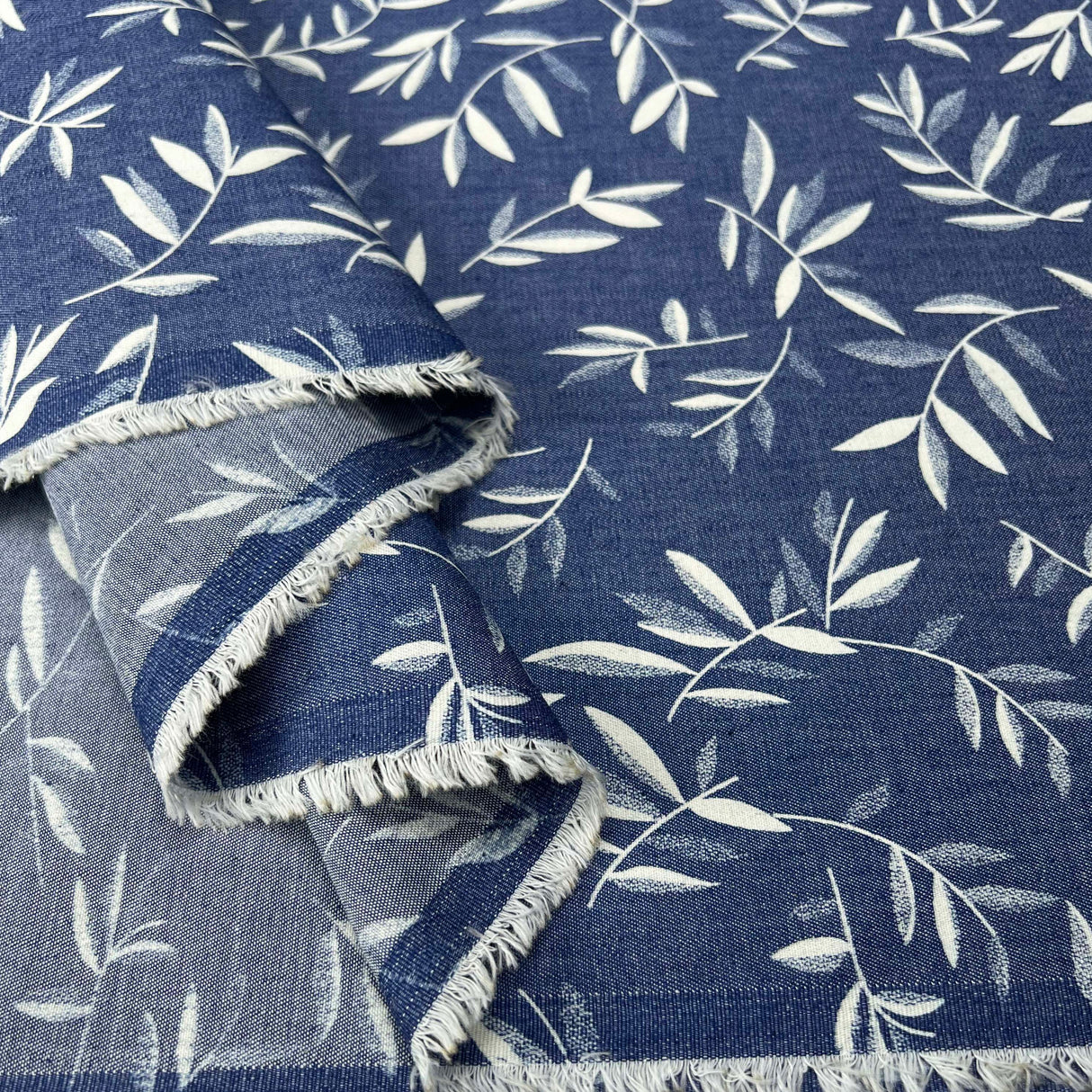 Heavenly Olive Leaf Cotton Denim Chambray Blue White Leaf Print Lightweight Woven Dress Fabric Fold