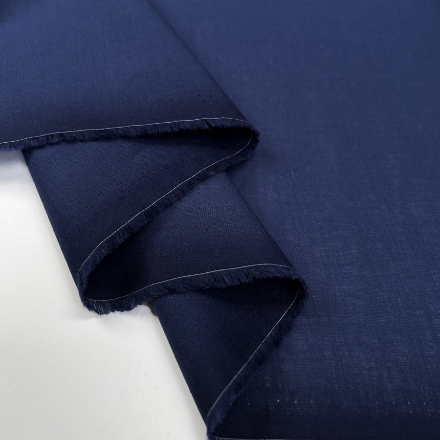 Pennine Cotton Lawn Navy Plain Woven Fine Lightweight Dress Fabric Fold