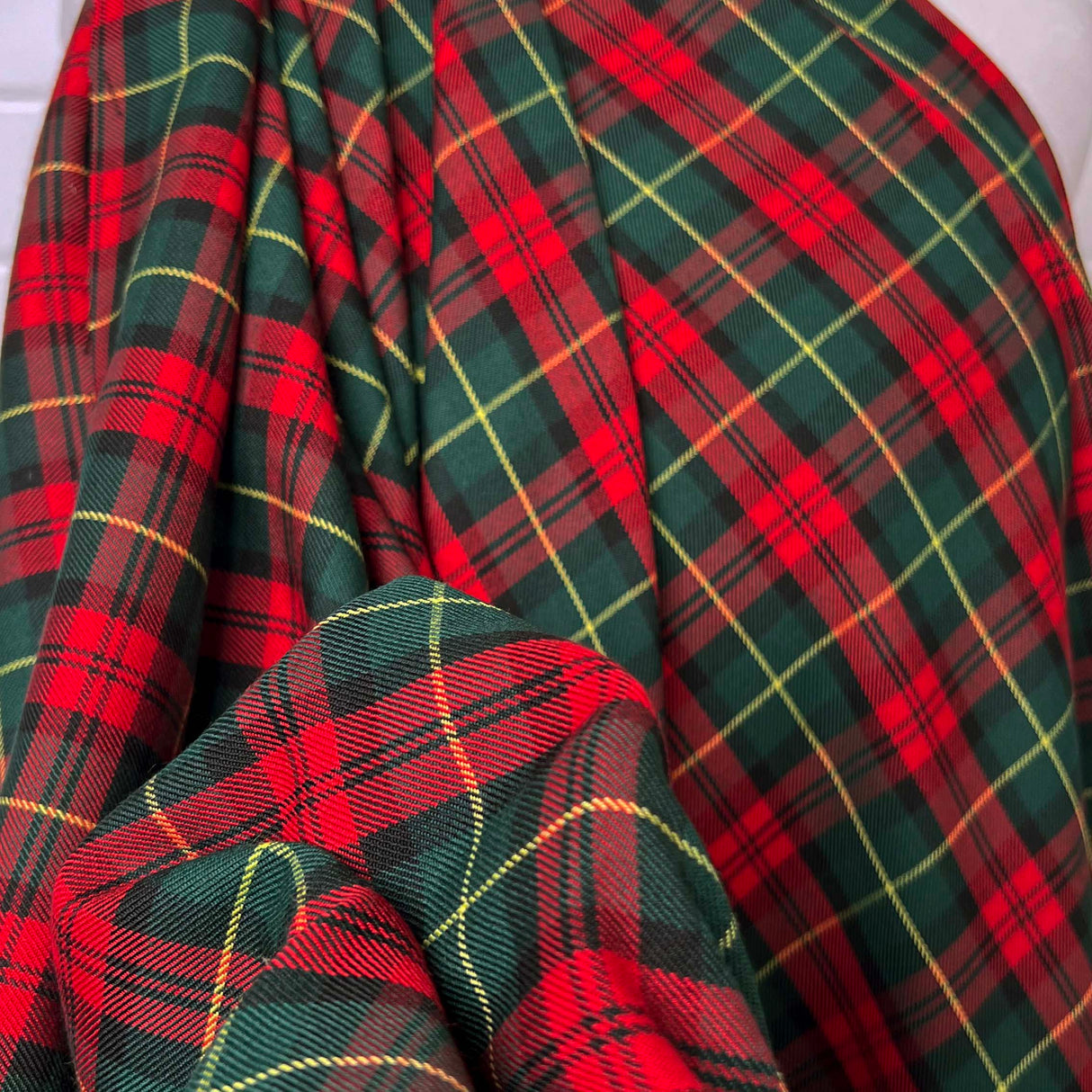 Tartan Aoife Polyester Viscose Red Green Check Dress Fabric Close up