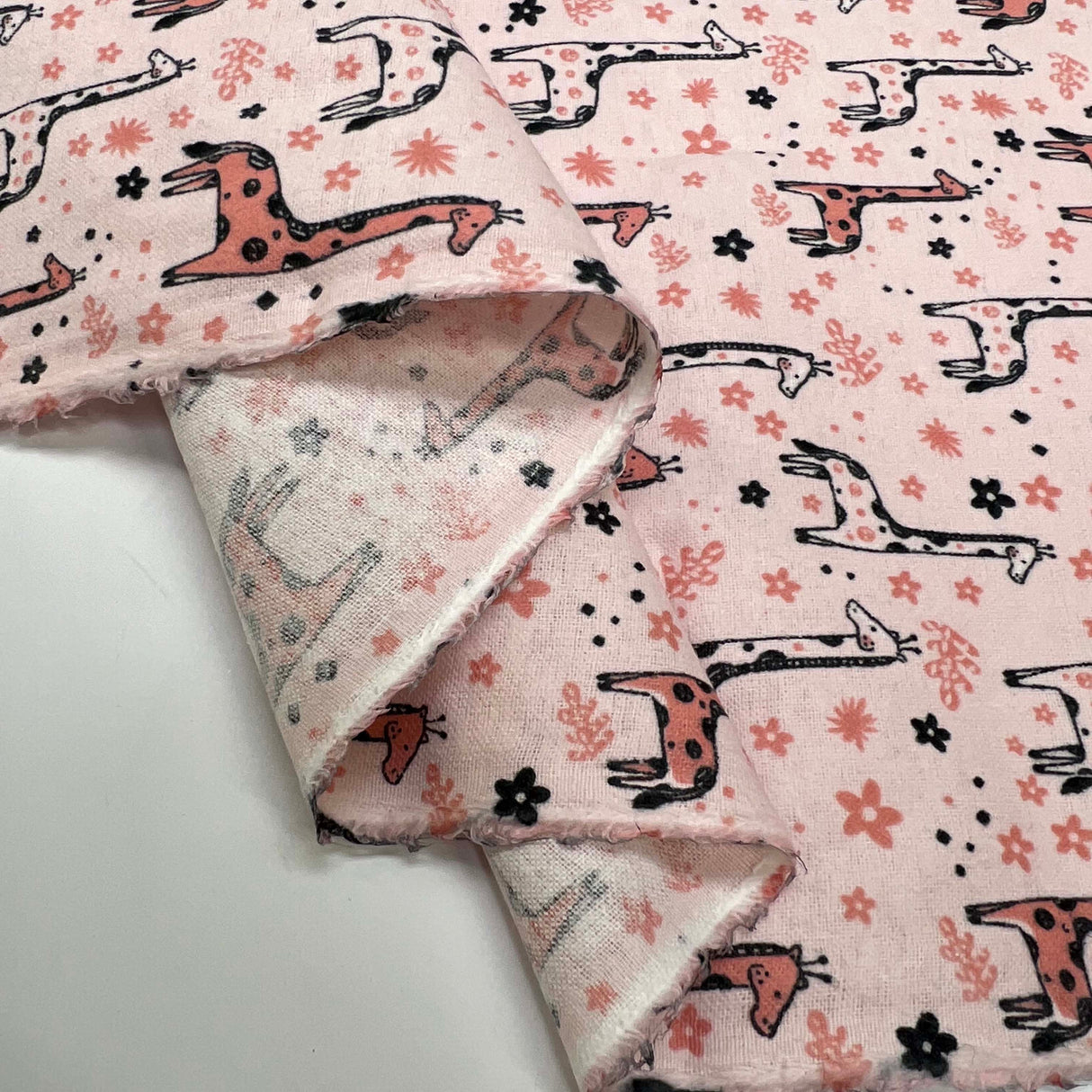 Winceyette Giraffes Pink Black Cotton Polyester Soft Brushed Flannel Childrens Fabric Fold