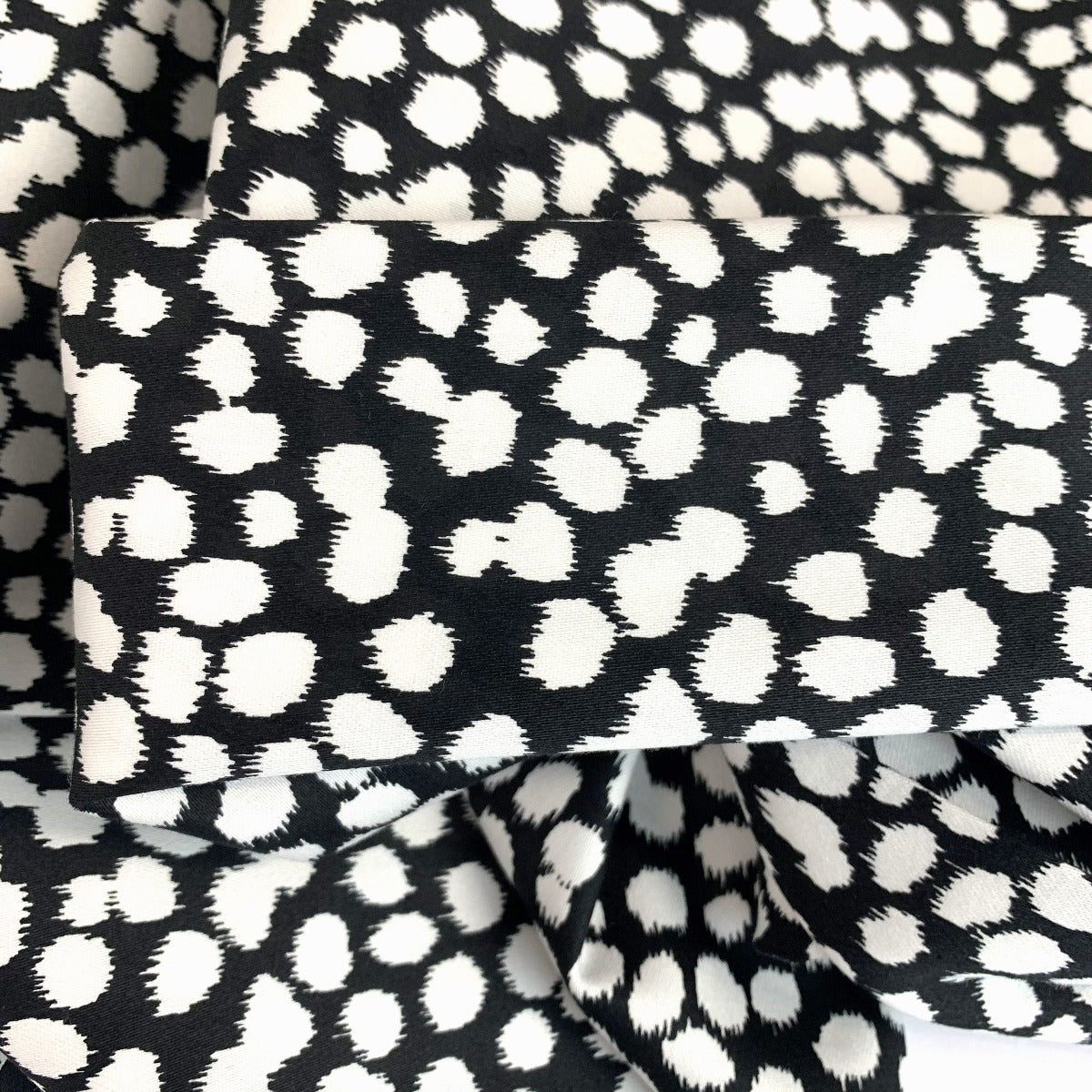 An Elegant Take Laurent Spotty Black White John Louden Stretch Woven Dress Fabric Fold