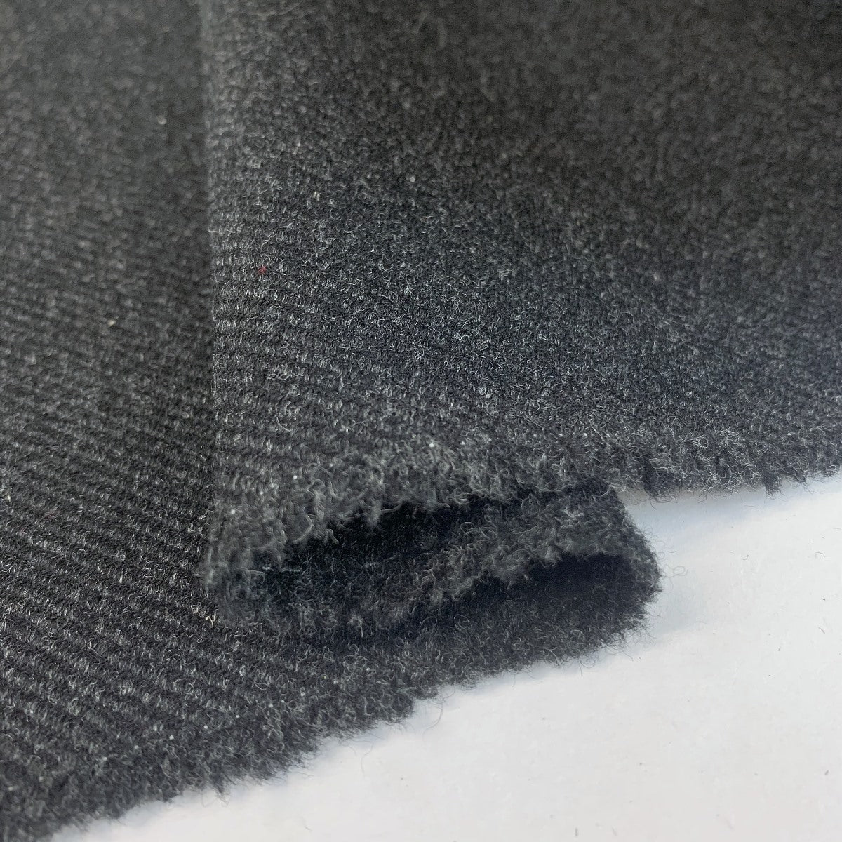 Bambrook Bygone British Wool Tweed Coating In Black And Grey Fold 3