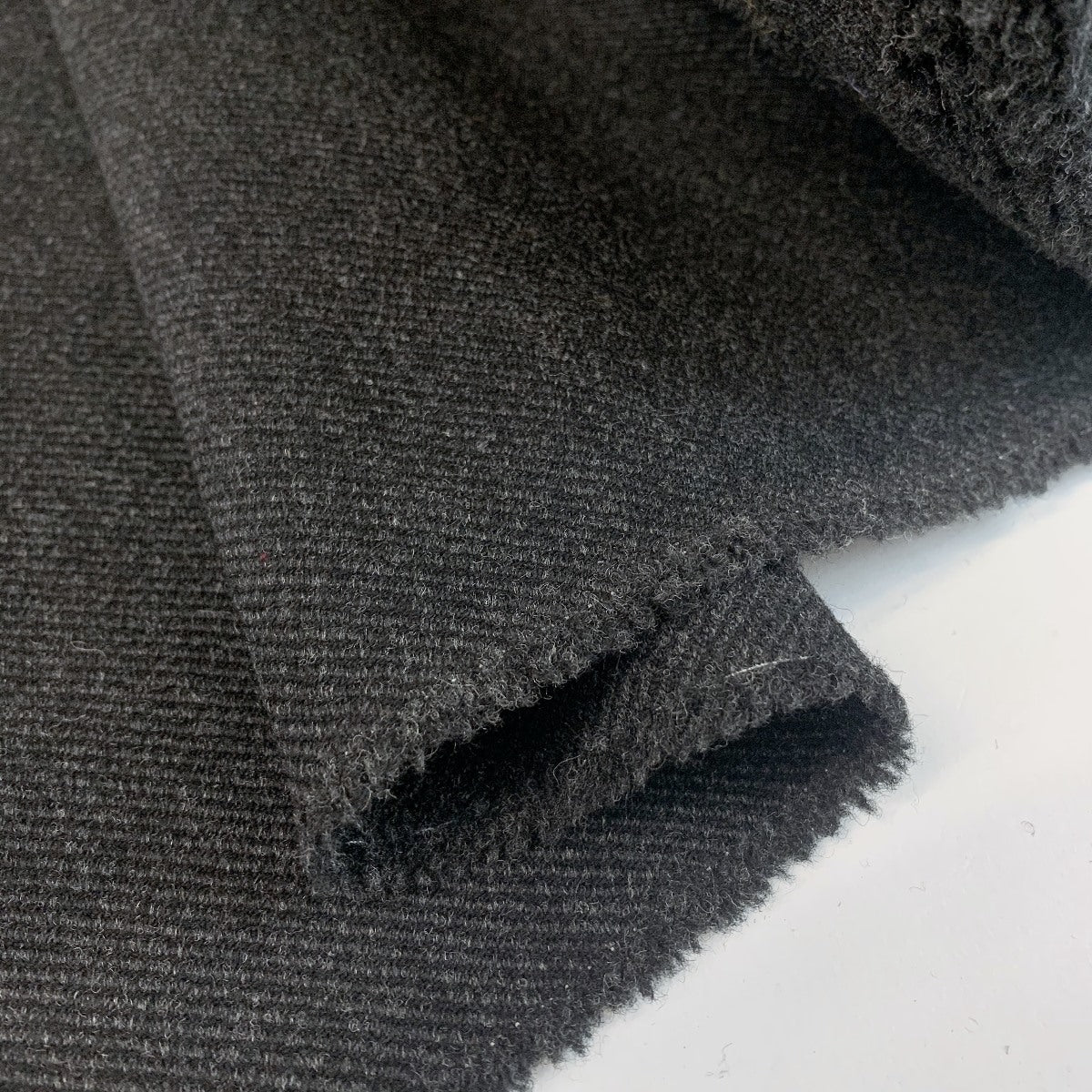 Bambrook Bygone British Wool Tweed Coating In Black And Grey Fold