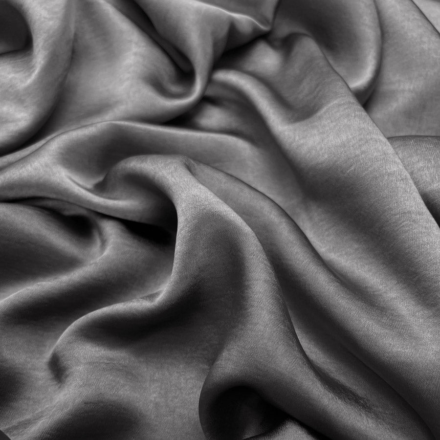 Bella Satin Stretch Grey Polyester Elastane Smooth Dressmaking Fabric Close up