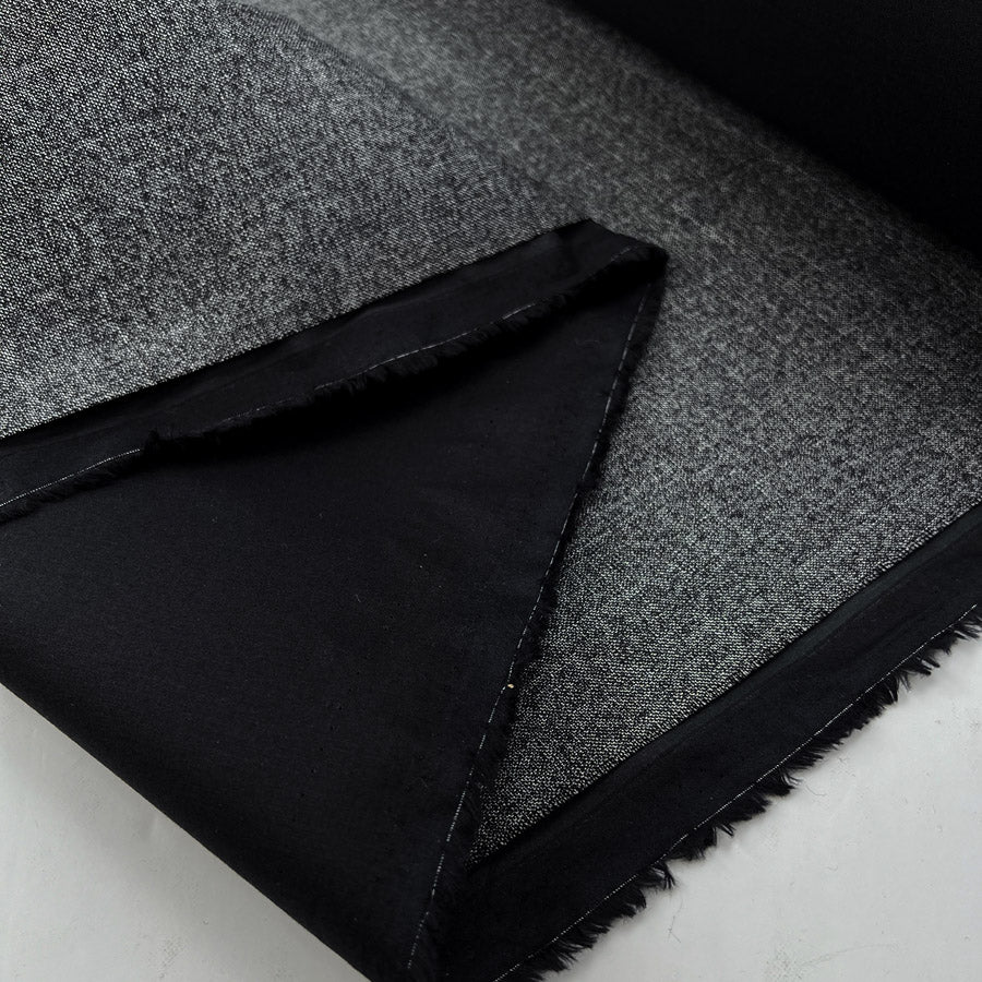 Bonded wool cotton grey marl british water resistant deadstock coating fabric fold