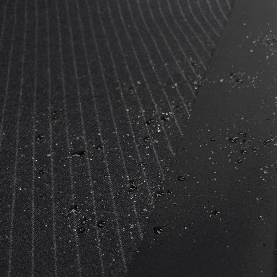 Bonded wool cotton little pin charcoal grey black deadstock british water resistant coating fabric cu