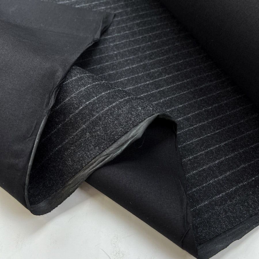 Bonded wool cotton little pin charcoal grey black deadstock british water resistant coating fabric fold