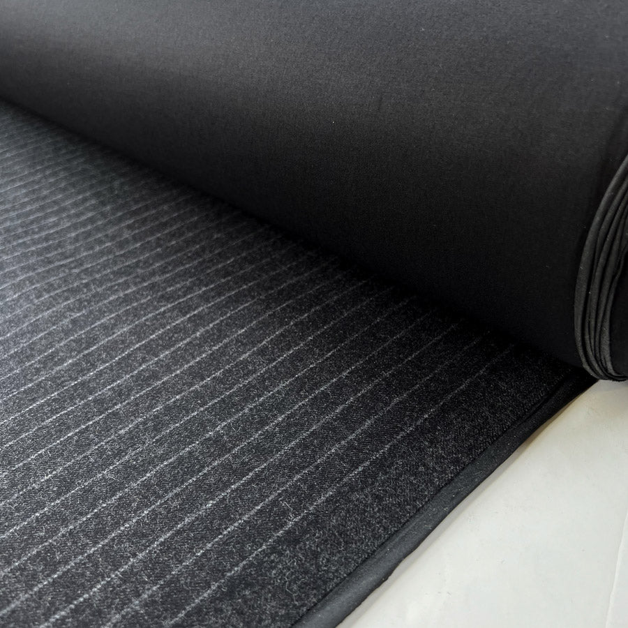 Bonded wool cotton little pin charcoal grey black deadstock british water resistant coating fabric roll