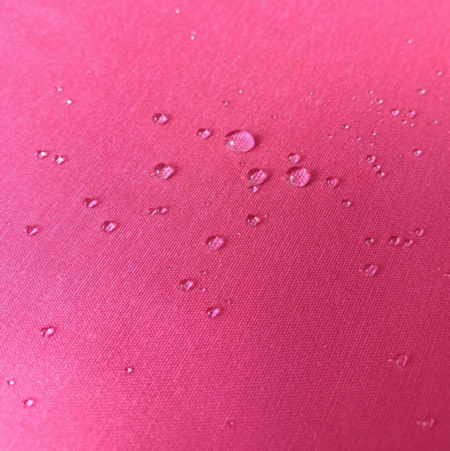 Chintz Finish Pink Polyester Lightweight Water Resistant Fabric Close Up Fabric Photo