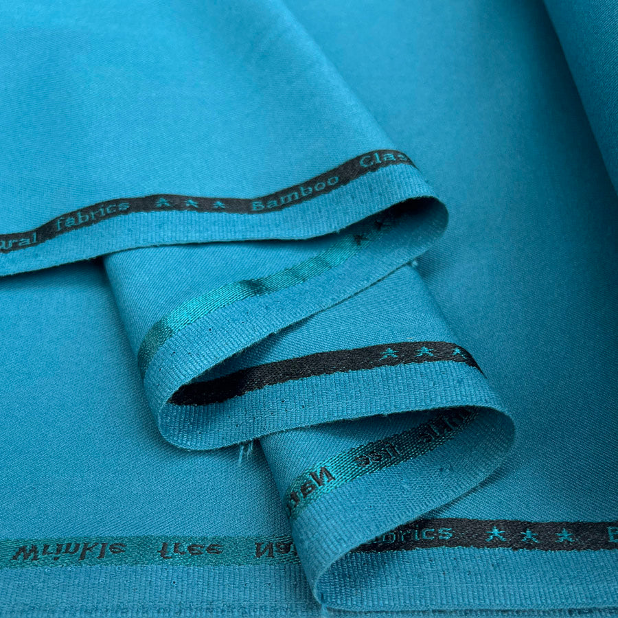 Draper Organic Bamboo Blend Stretch Suiting Fabric Petrol Fold