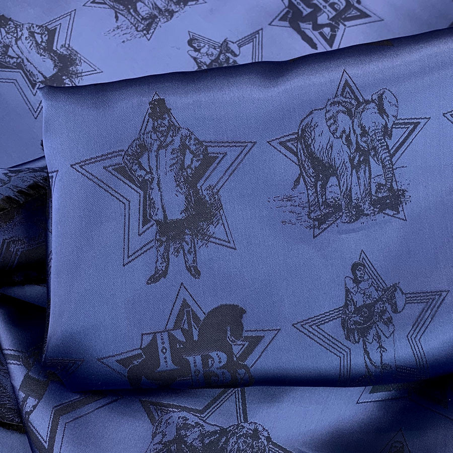 E210 Greatest Showman Blue Royal Blue Elephant Polyester Woven Lining Fabric Close Up Fabric Photo 2
