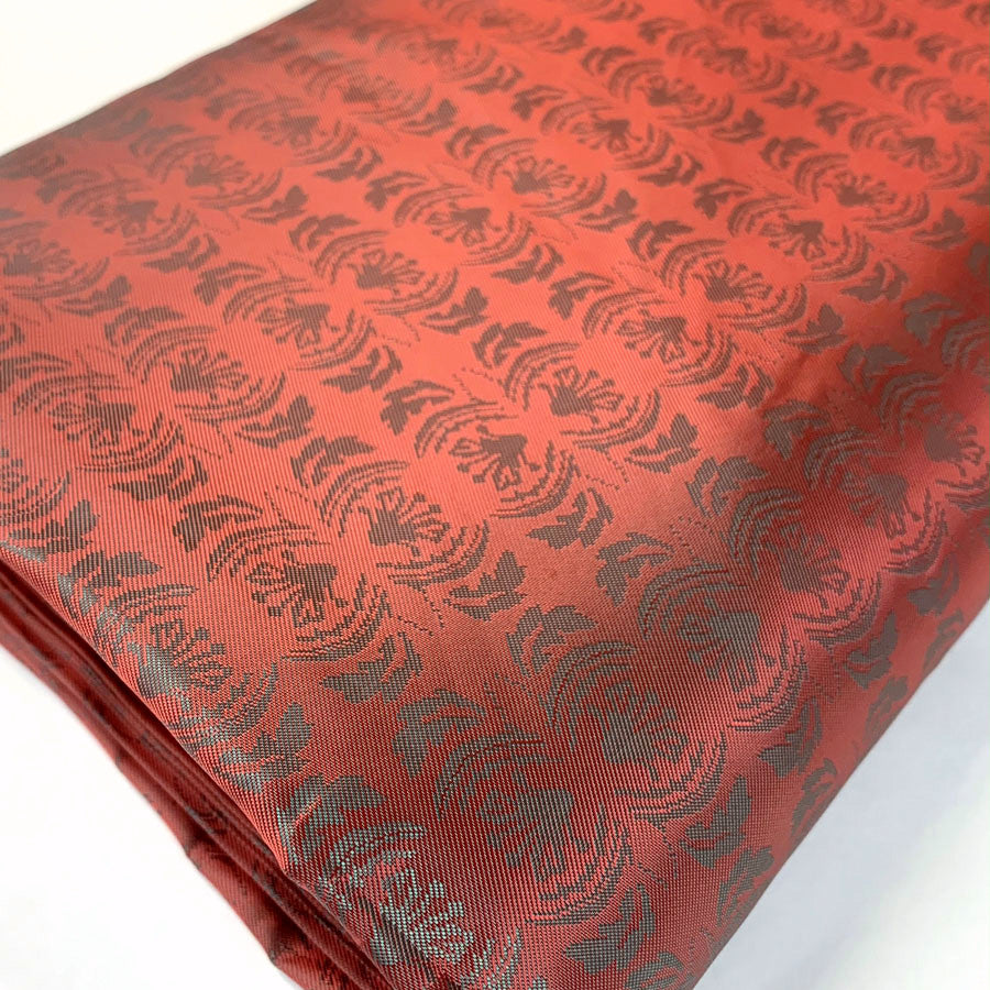 E210 Mirrored Red Pale Green Mirrored Leaf Design Pattern Lining Fabric Fabric Photo