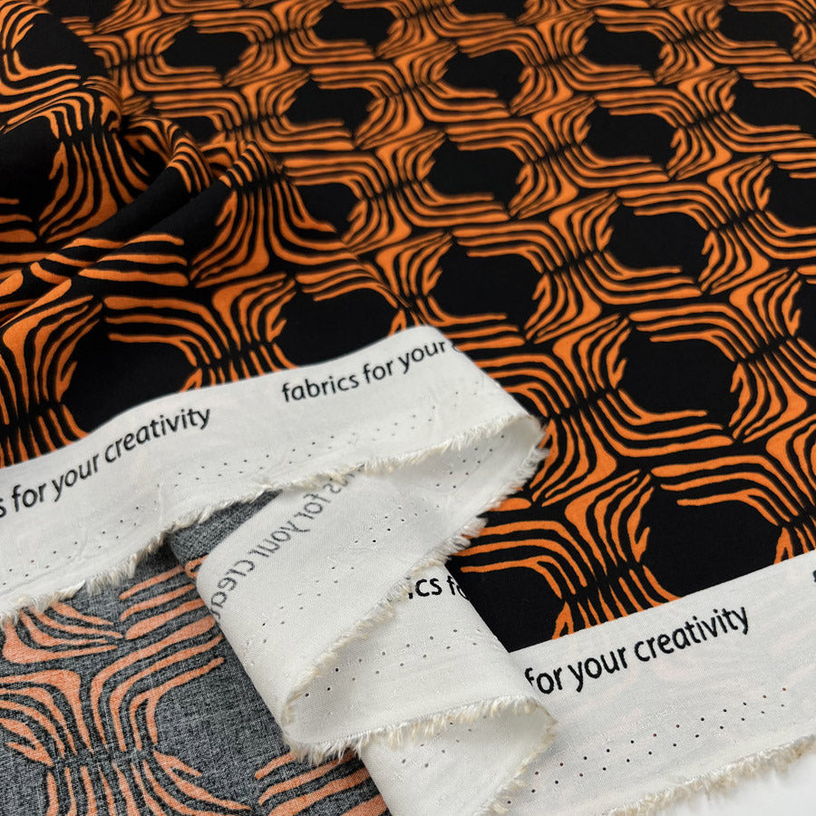 Ember Glow Black Orange Abstract Viscose Dress Fabric Fold