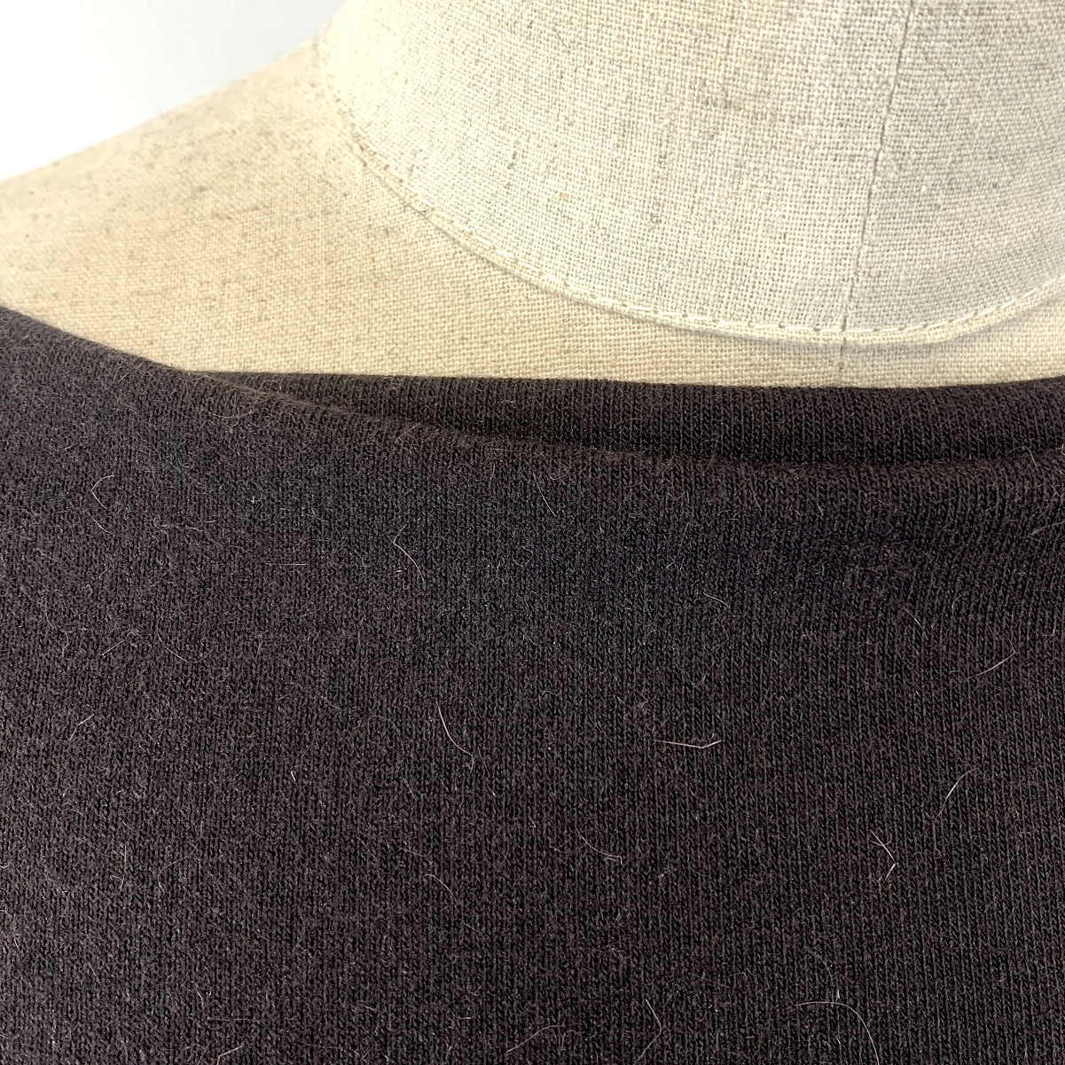 Ernie Polyester Loosely Knitted Dark Brown Jersey Dress Fabric Manequin Close Up Fabric Photo