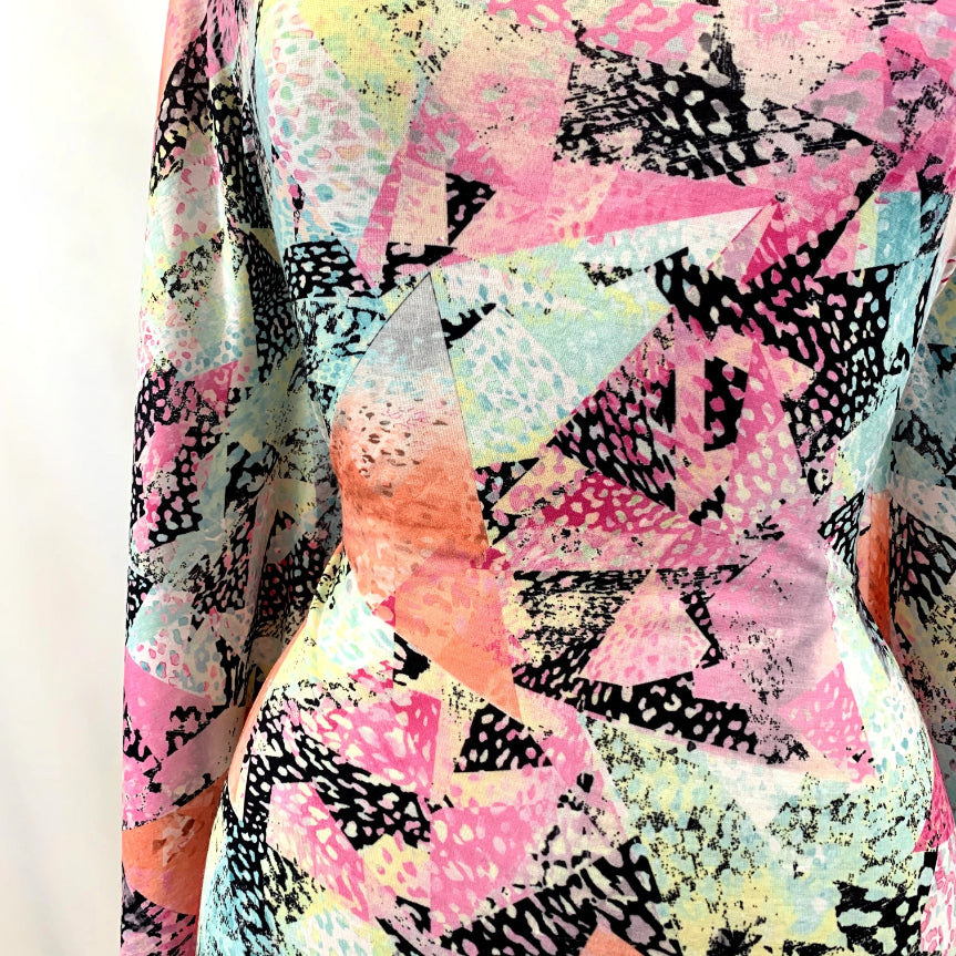 Festive Madness Polyester Multicoloured Bright Neon Jersey Dress Fabric Manequin Close Up Fabric Photo C4438Ed7 090C 4193 9E44 3726A525B68F