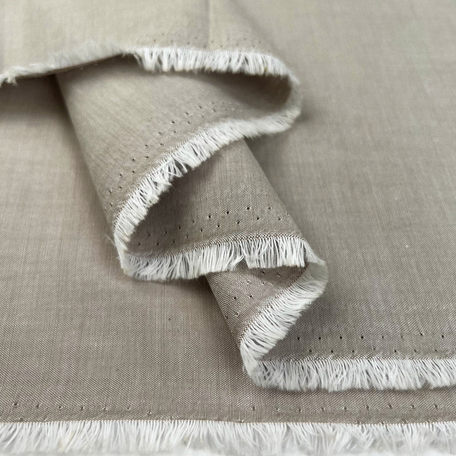 Finest Chambray Sand Cotton Lightweight Plain Woven Dress Fabric Fold