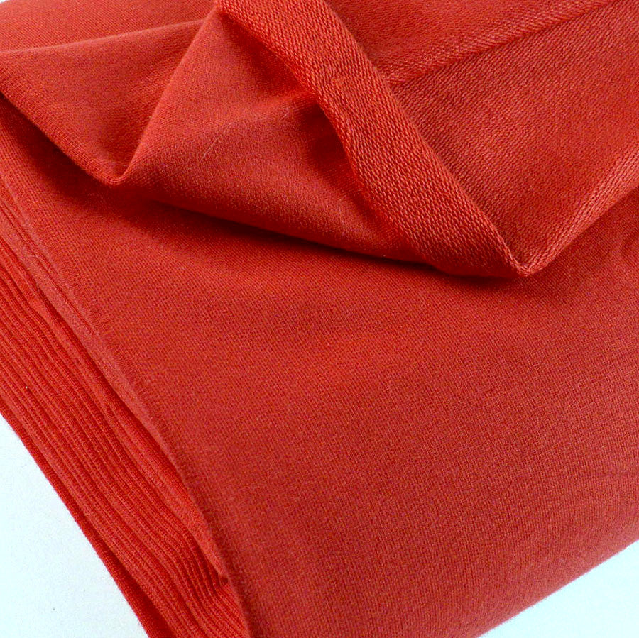 French Terry Red Jersey Fabric With A Looped Back Scale Fabric Close Up Photo