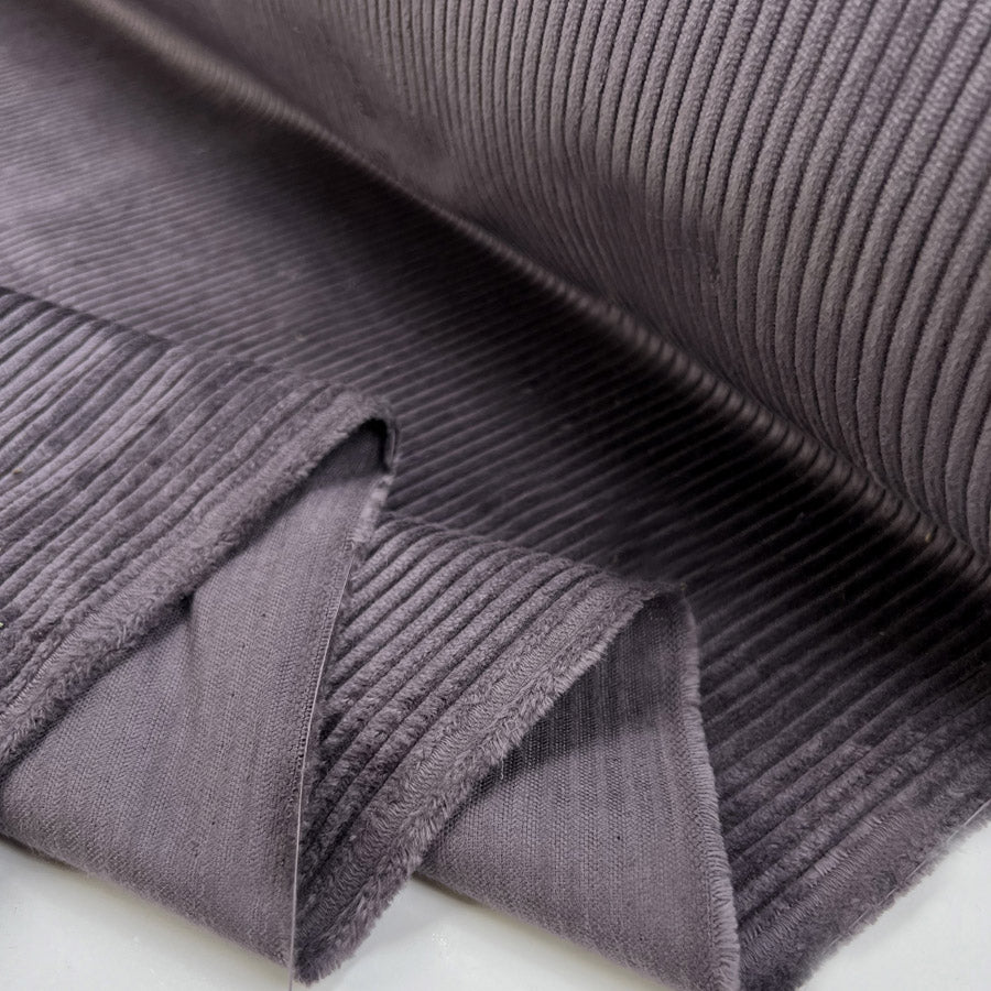 Jumbo corduroy lavender purple cotton 5 wale trouser fabric fold