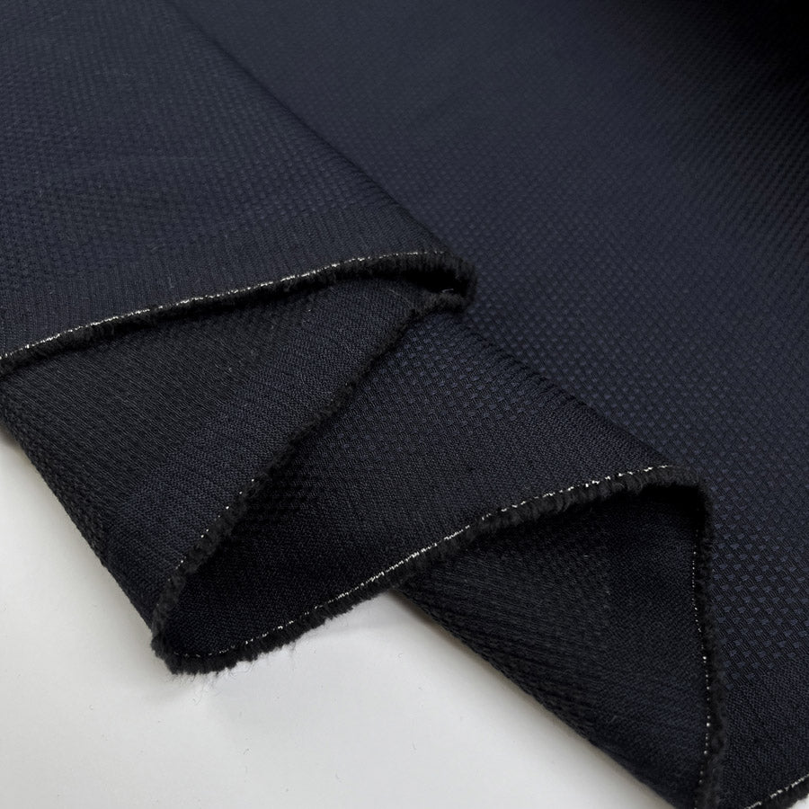 Knobbled Dark Navy Cotton Bobbled Suiting Fabric Fold