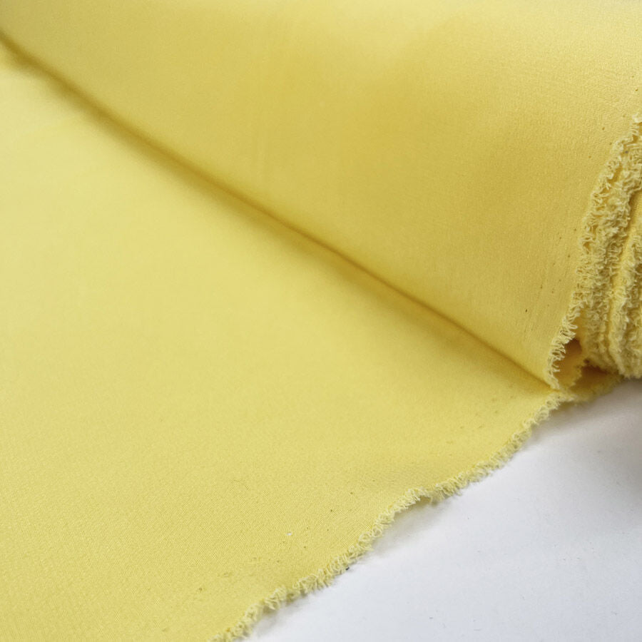 Limoncello silk yellow plain woven italian lightweight dress fabric roll