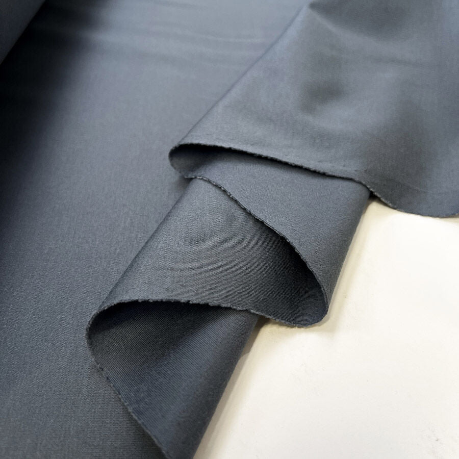 Liscia Cotton Blue Stretch Knit Airforce Italian Suiting Fabric Fold