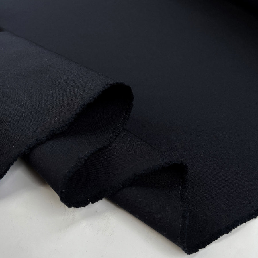 Mr Smith Dark Navy Plain Woven Wool Suiting Fabric Fold