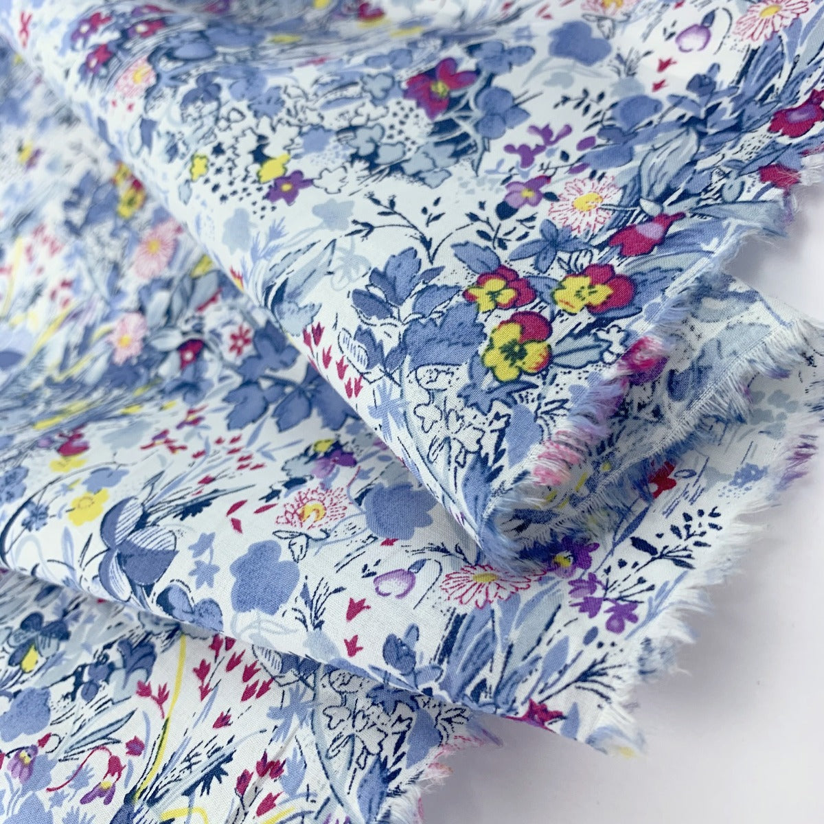 Pima Cotton Lawn The Garden Of Shakespeare Pale Blue Folded