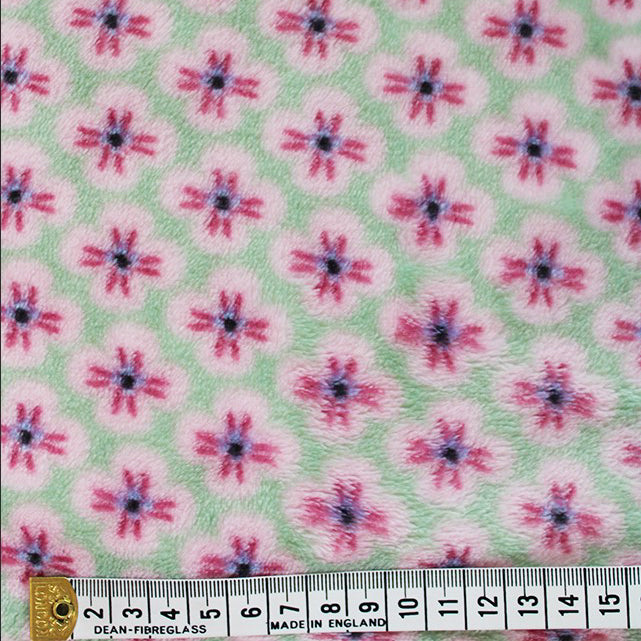 Polyester Double Sided Cuddles Fleece Fabric Pistachio Flowers Ruler