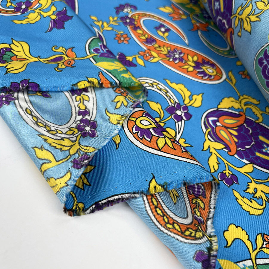 Silks of italy paisley pop blue woven floral italian bright multicoloured dress fabric fold