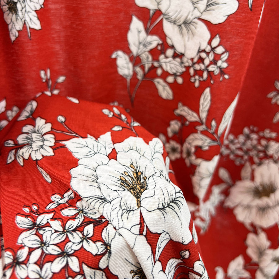 Turn The Night Sky Red Slinky Polyester Elastane Floral Printed Knitted Jersey Fabric Hand