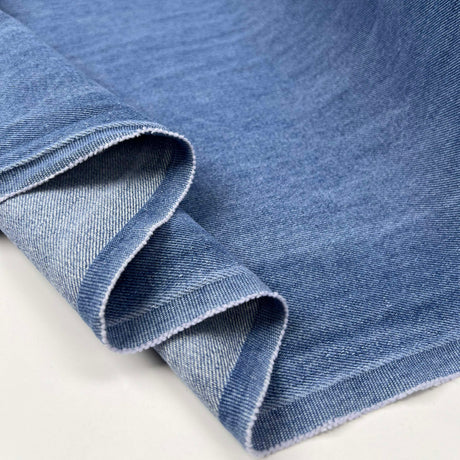 10oz Washed Denim Archie Cotton Blue Sky Plain Woven Jean Trouser Fabric Fold