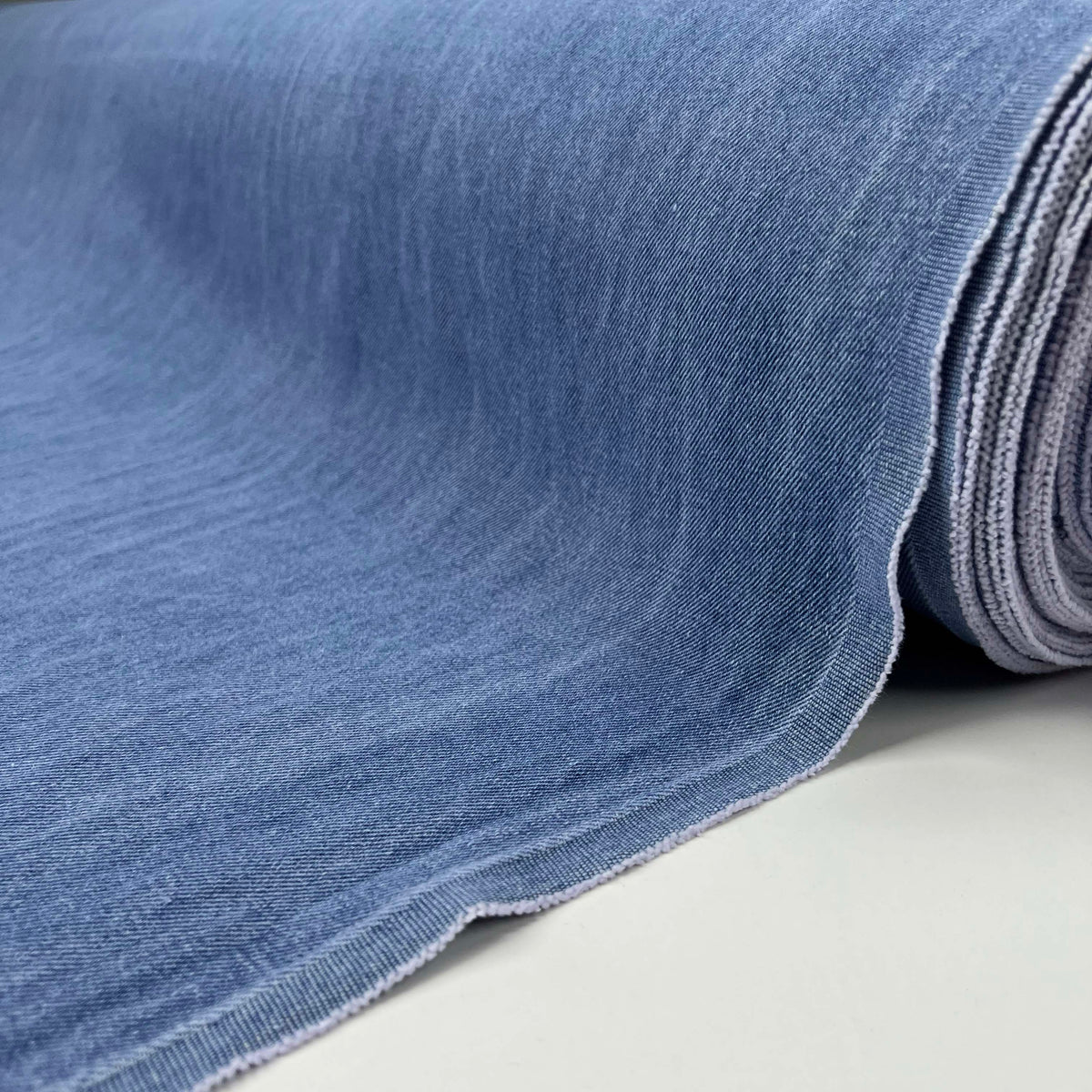 10oz Washed Denim Archie Cotton Blue Sky Plain Woven Jean Trouser Fabric Roll