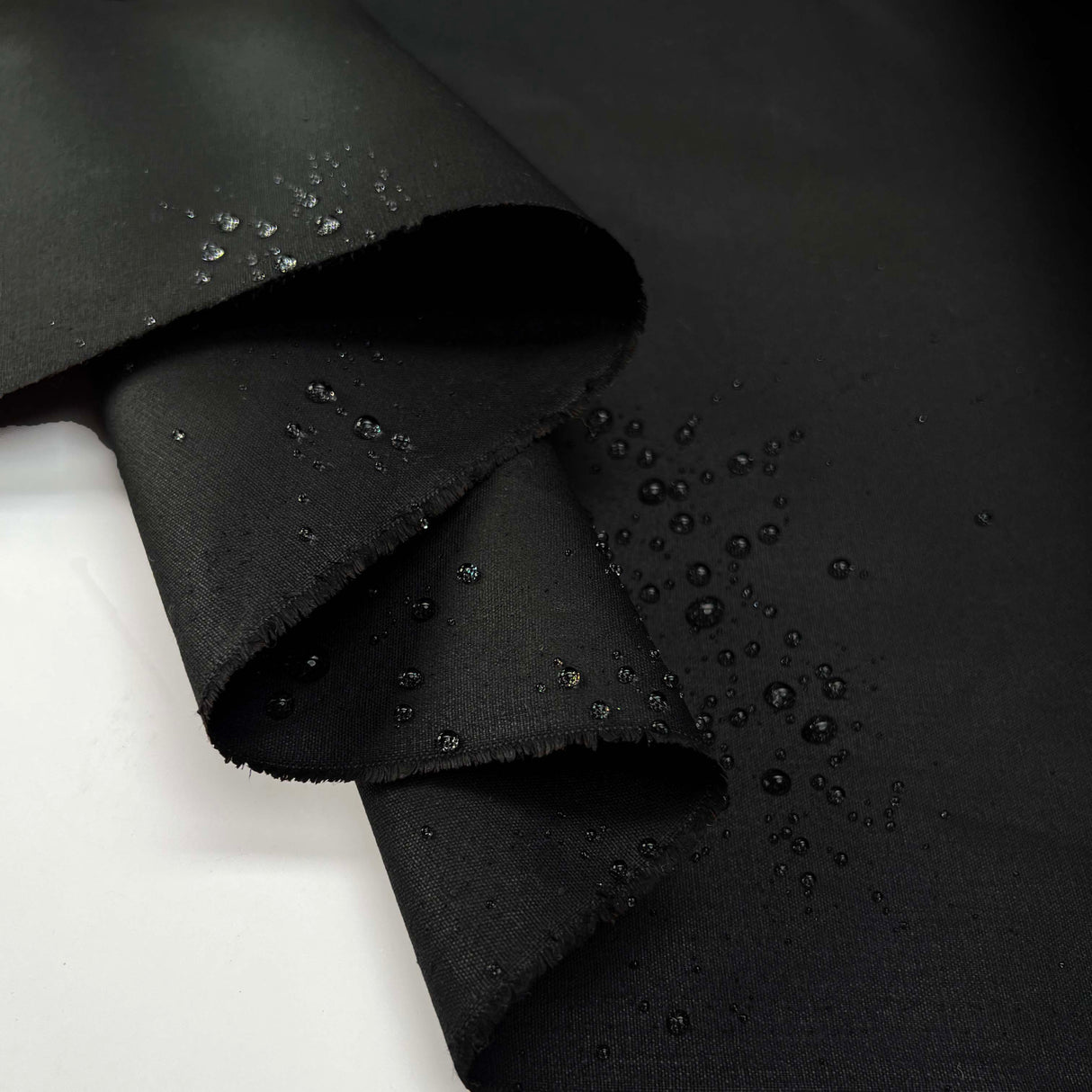 12oz_Waxed_Cotton_Black_British_Water_Resistant_Coating_Fabric_Splash