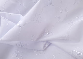 5 Hole Broderie Anglaise Fabric Moons White Close Up