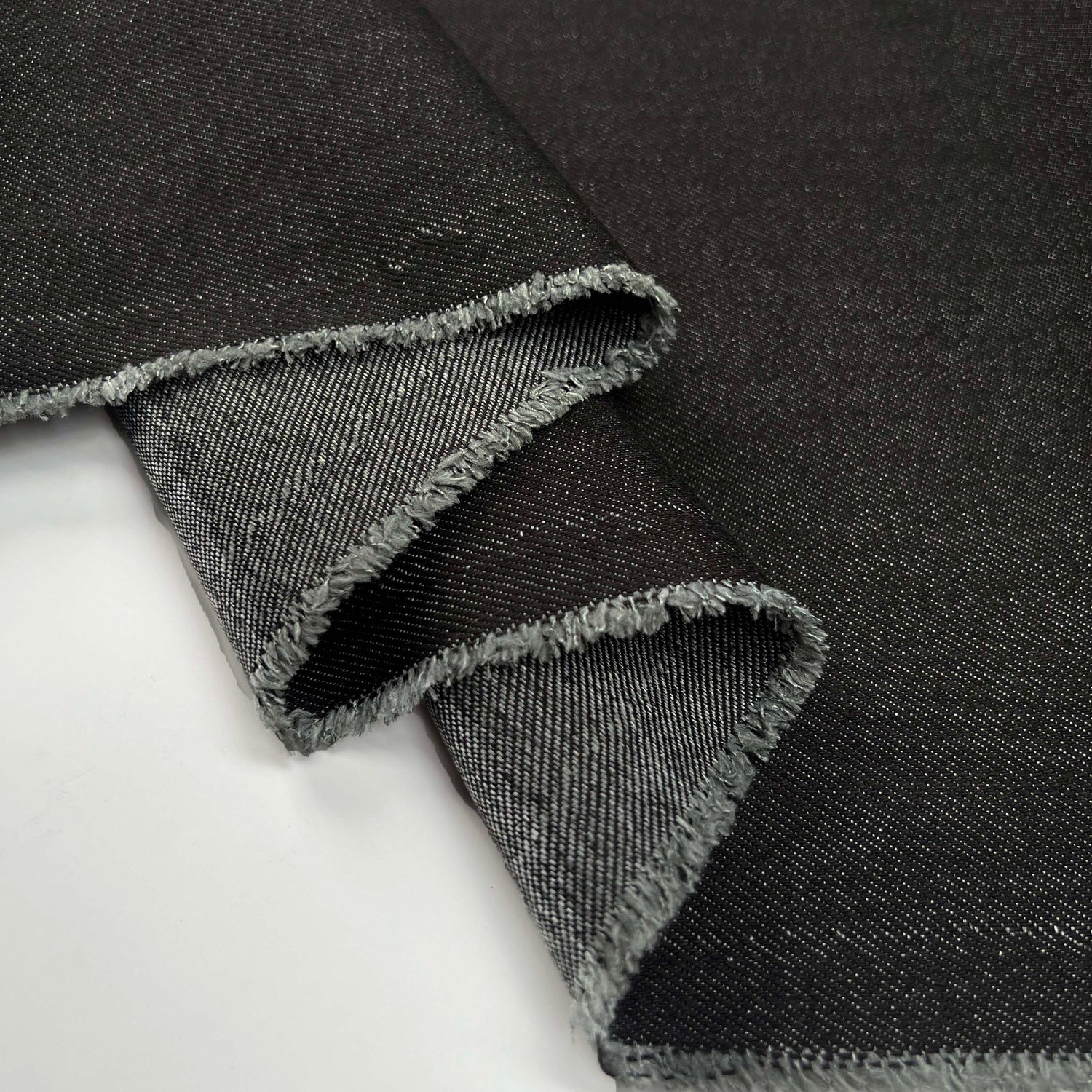 7.5oz City Denim Black Cotton Woven Trouser Fabric Fold