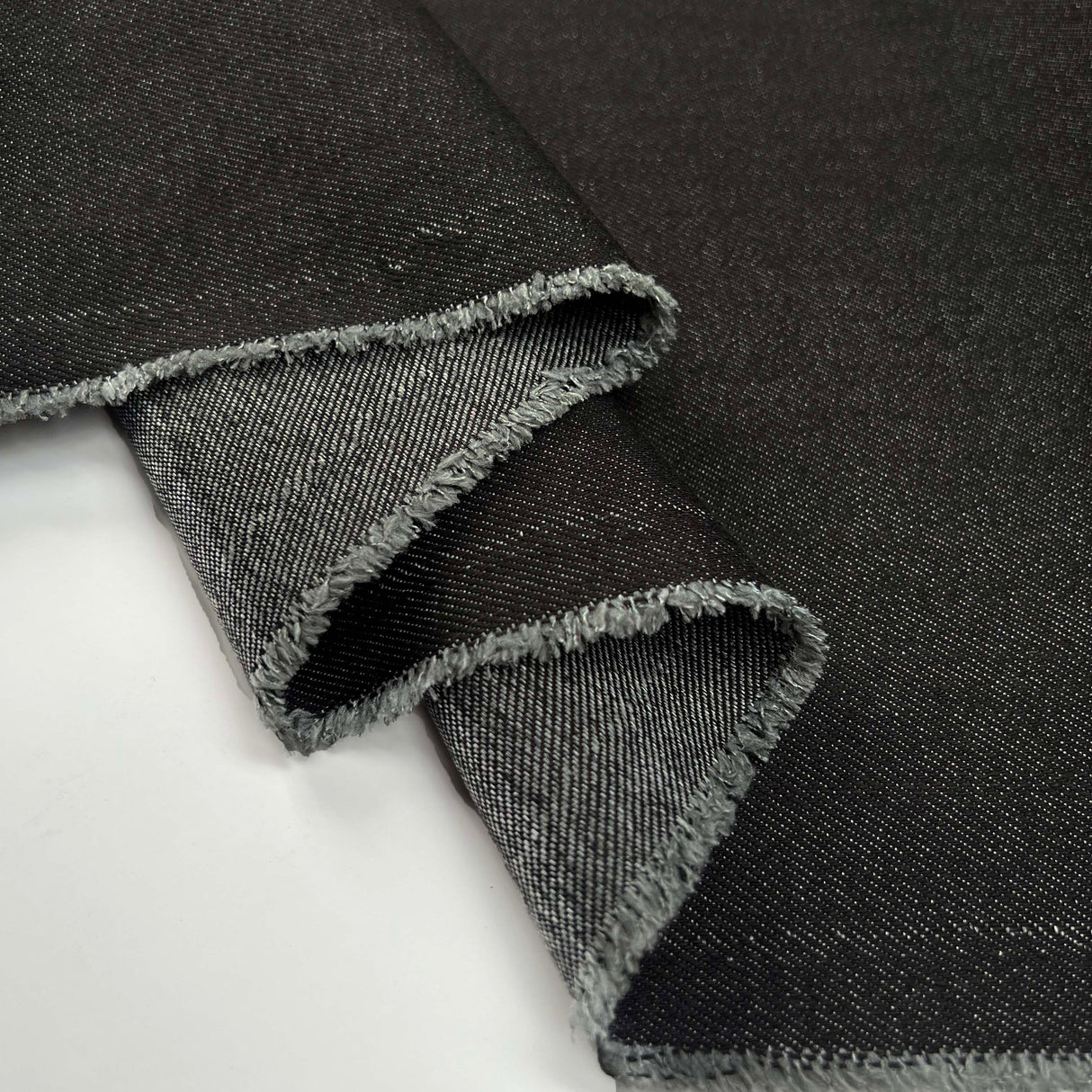 7.5oz City Denim Black Cotton Woven Trouser Fabric Fold