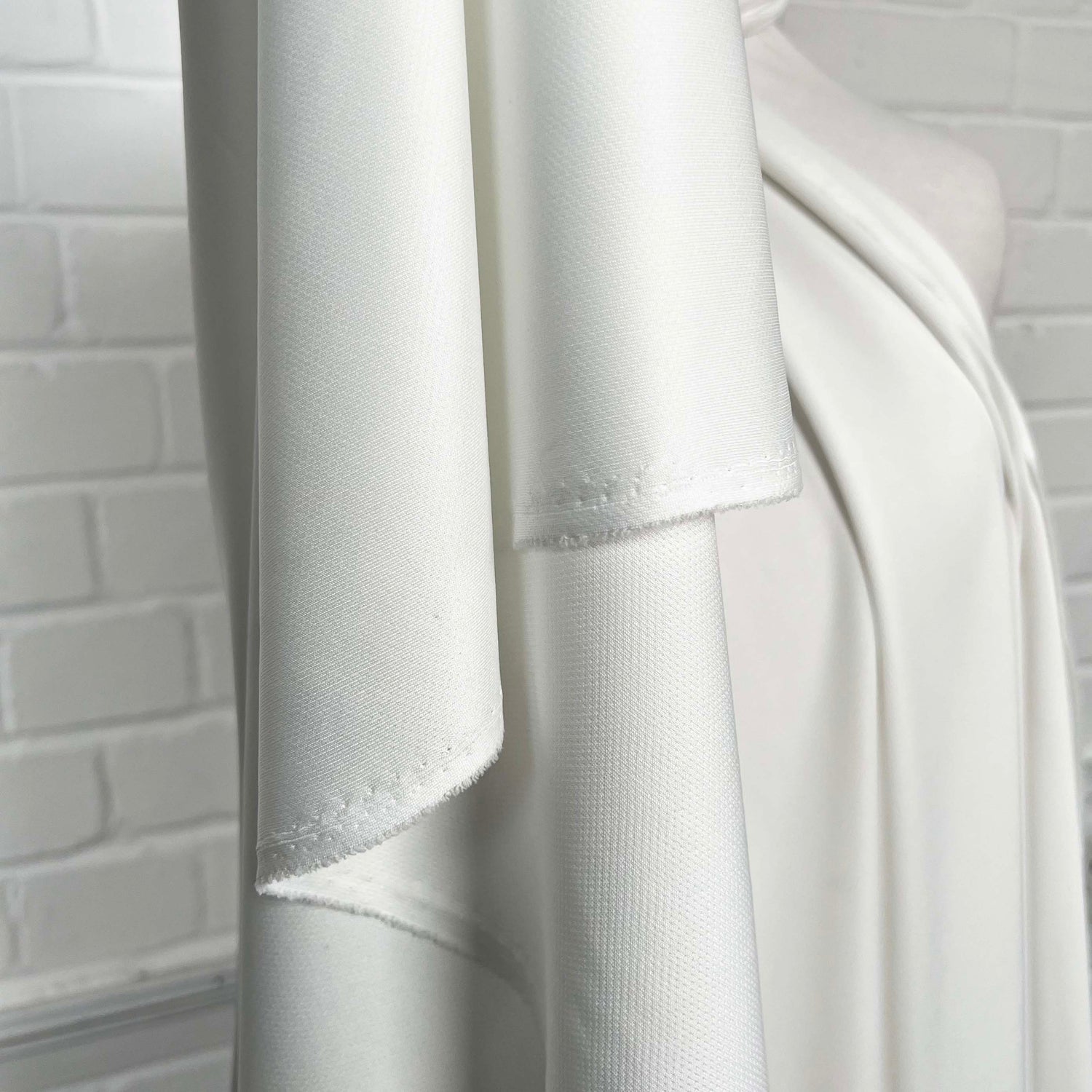 Aero White Polyester Elastane Soft Lightweight Knit Jersey Fabric Hang