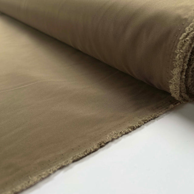 All Singing Italian Plain Nylon Lightweight Beige Fabric Roll
