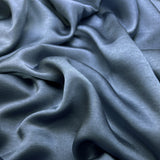 Bella Satin Stretch Petrol Blue Polyester Elastane Smooth Dressmaking Fabric Close up