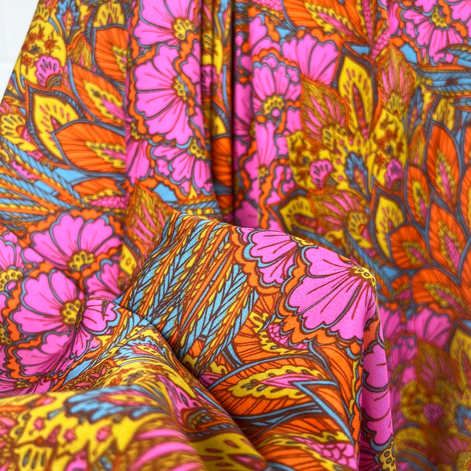 Bold Floral Paisley Orange and Pink Viscose Abstract Dress Fabric Close Up