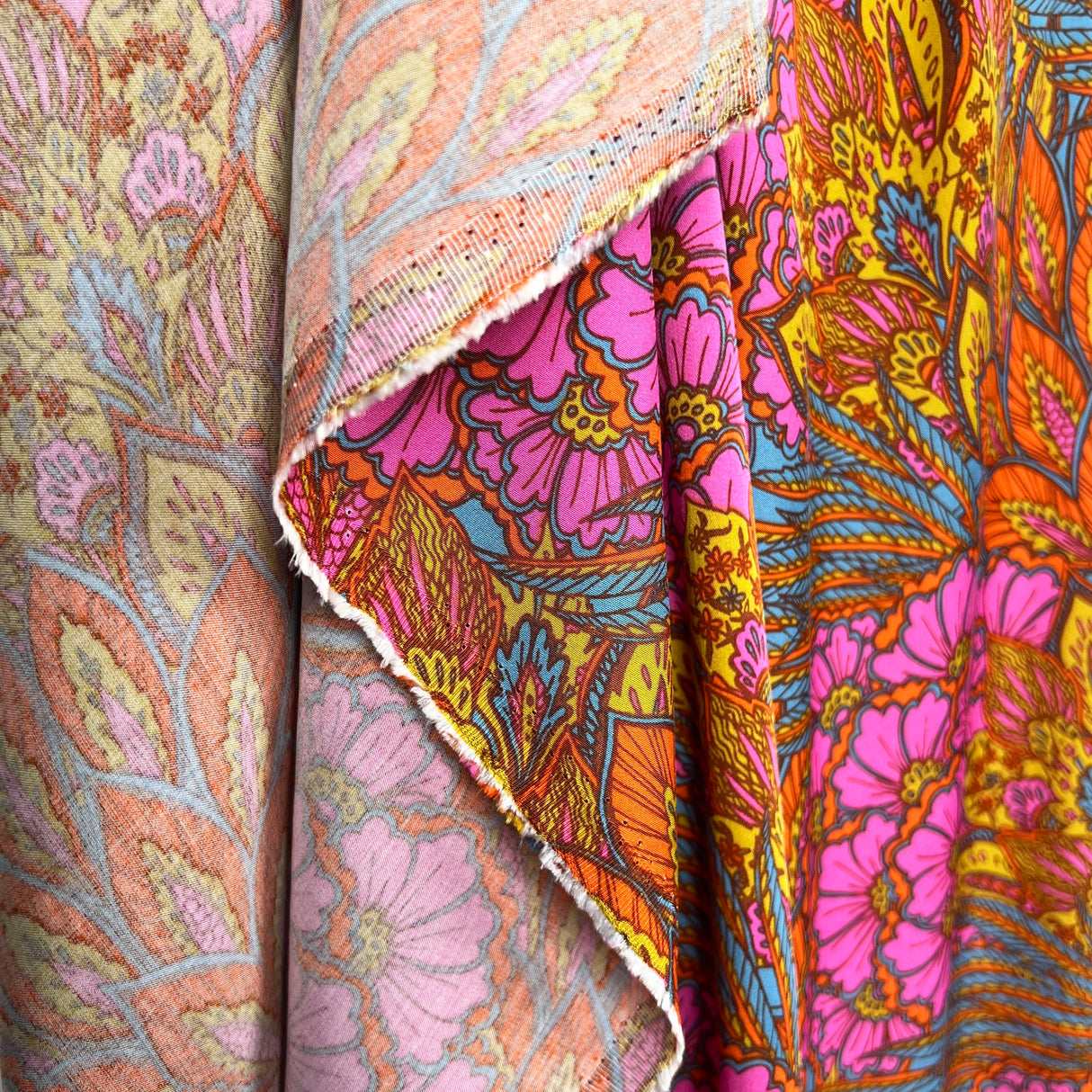 Bold Floral Paisley Orange and Pink Viscose Abstract Dress Fabric Hang