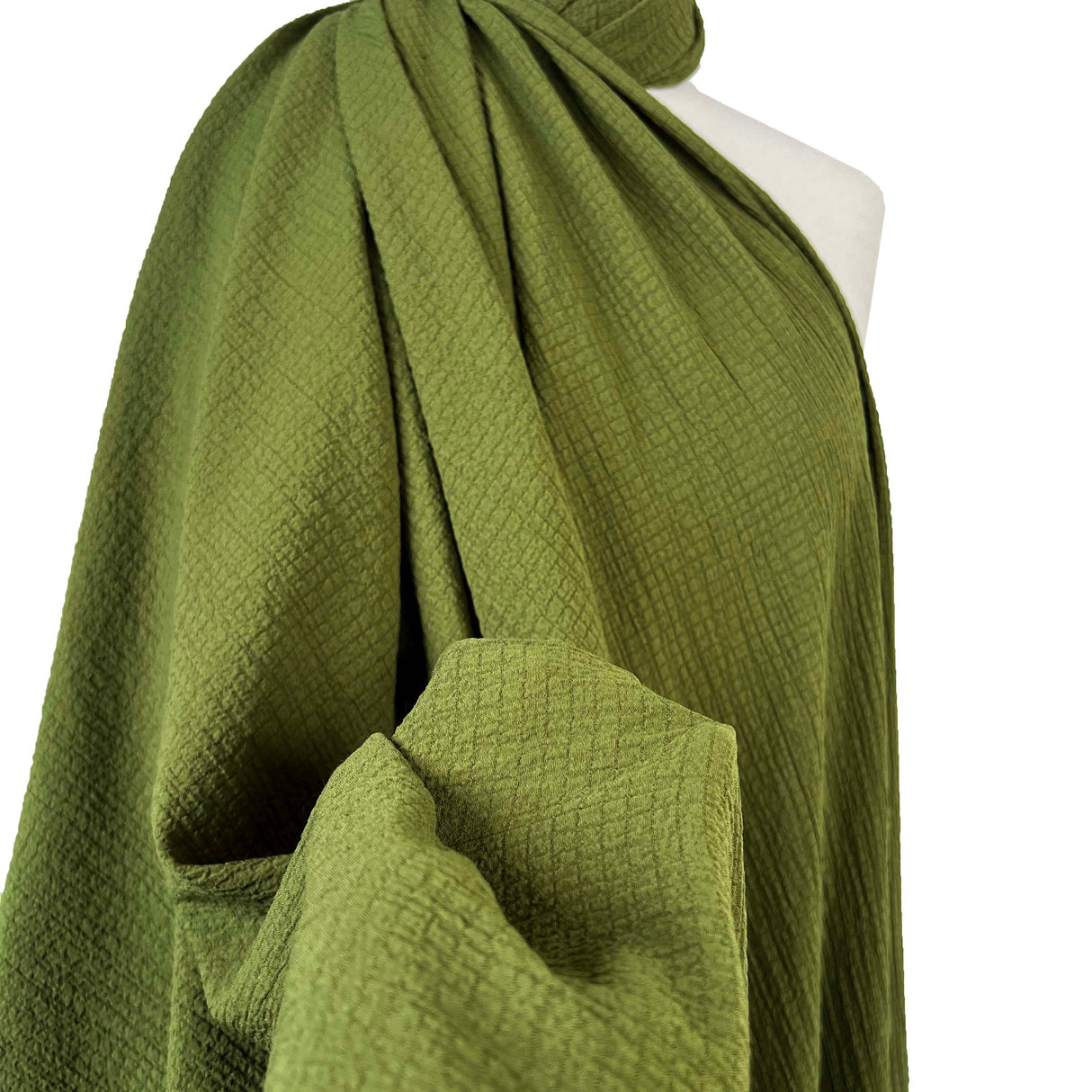 Bubble_Viscose_Green_Polyester_Elastane_195gsm_Crinkle_Woven_Dress_Fabric_draped
