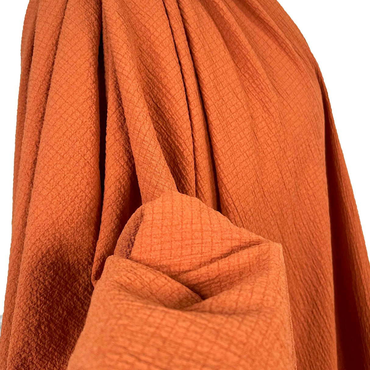 Bubble_Viscose_Rust_Polyester_Elastane_195gsm_Crinkle_Woven_Dress_Fabric_CU