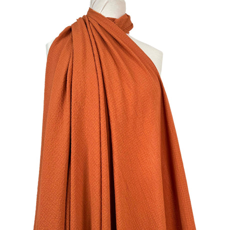 Bubble_Viscose_Rust_Polyester_Elastane_195gsm_Crinkle_Woven_Dress_Fabric_Drape