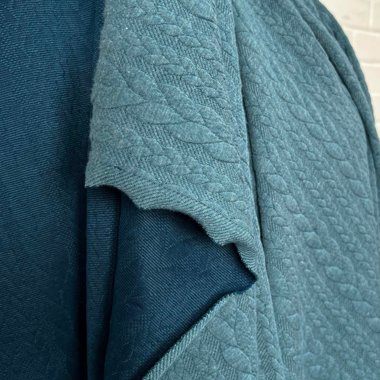 Cable Jersey Teal Marl Blue Polyester Viscose Elastane Rope Double Knit Fabric Fold