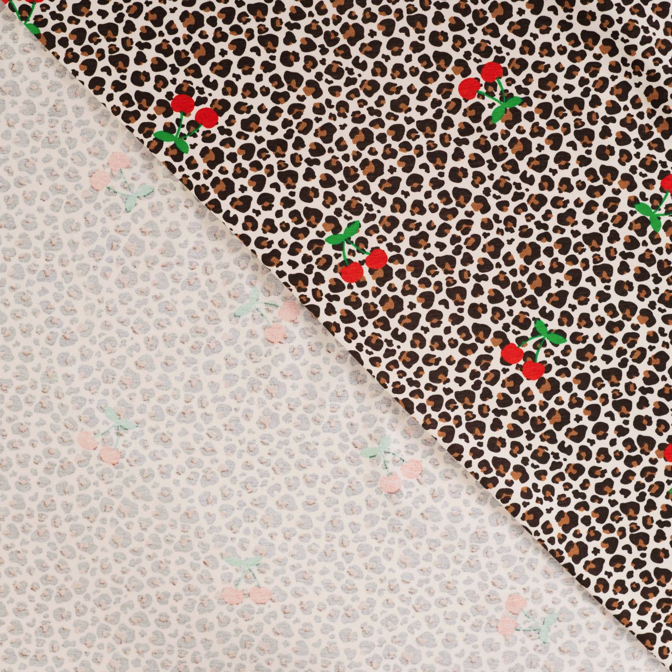 Cherry Roar Animal Fruit Print Knitted Cotton Jersey 190gsm Dress Fabric Fold