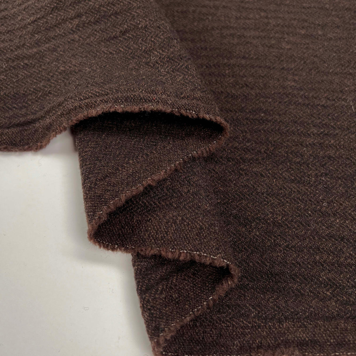 Cocoa Butter Wool Polyester Elastane Brown Herringbone Coating Fabric Fold