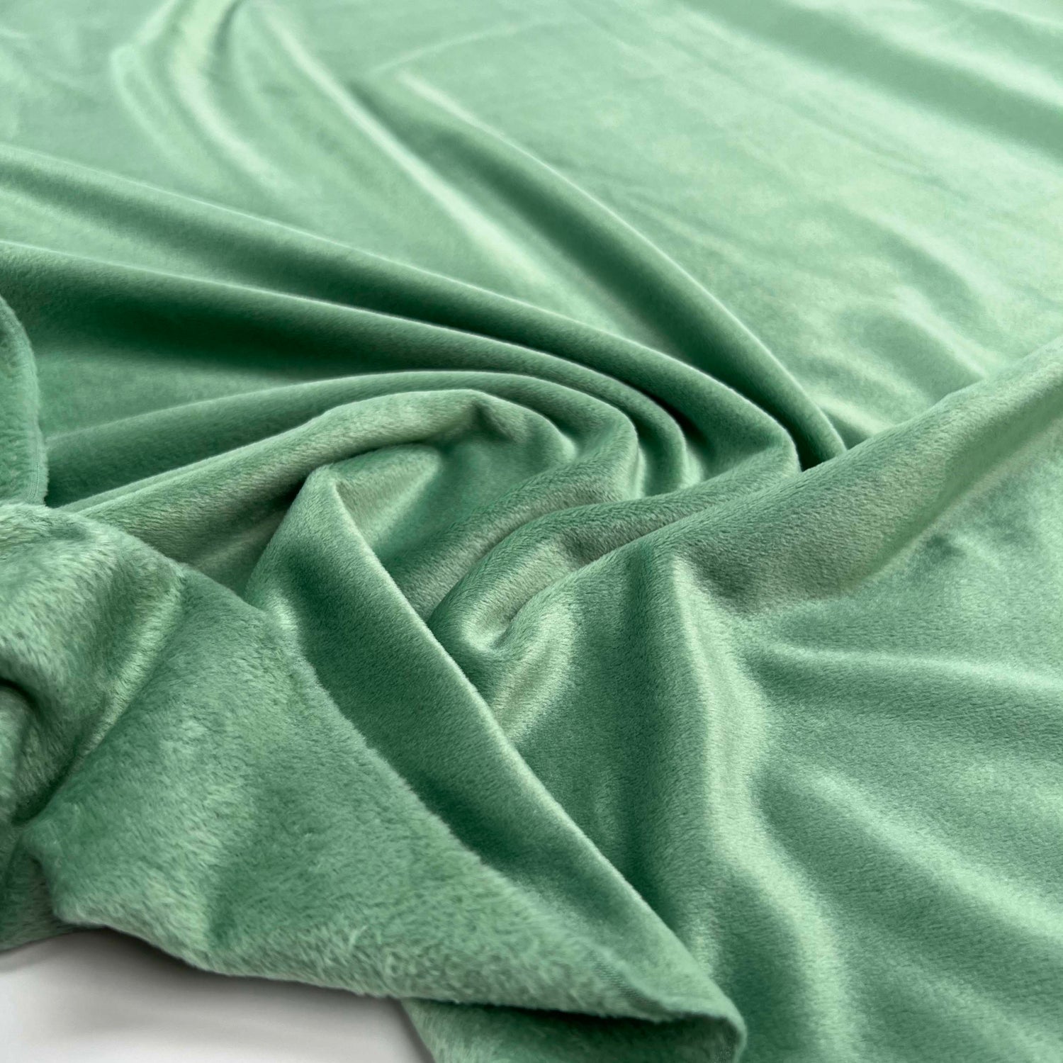 Comfort Velour Mint Green Polyester Elastane Soft Fleece Jersey Fabric Close up 